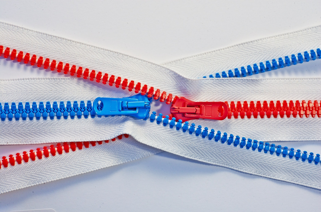 Blue and red zip that cross over each other